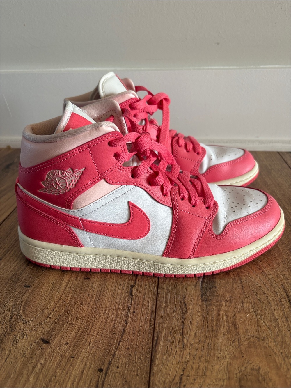 Jordan Women’s Pink and White High-Top Sneakers - size 8